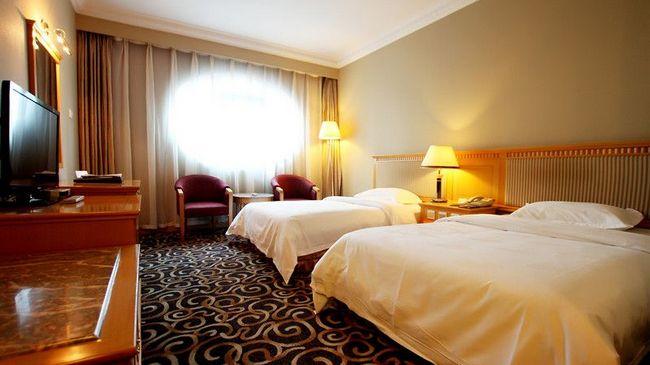 Modern Hotel Harbin Værelse billede